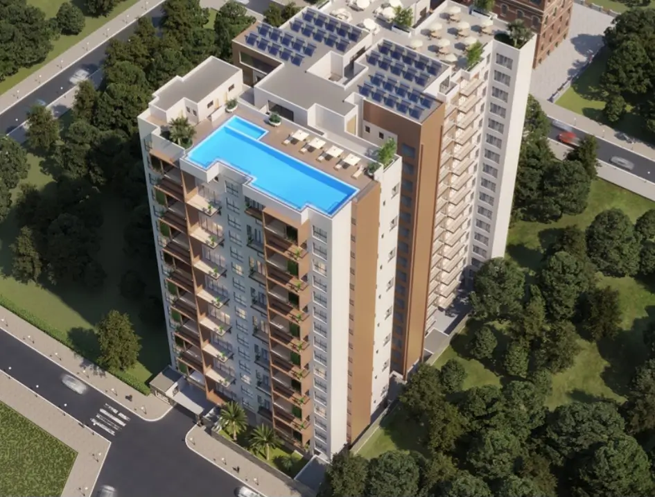 CGI aerial render of tall apartment block with rooftop pool