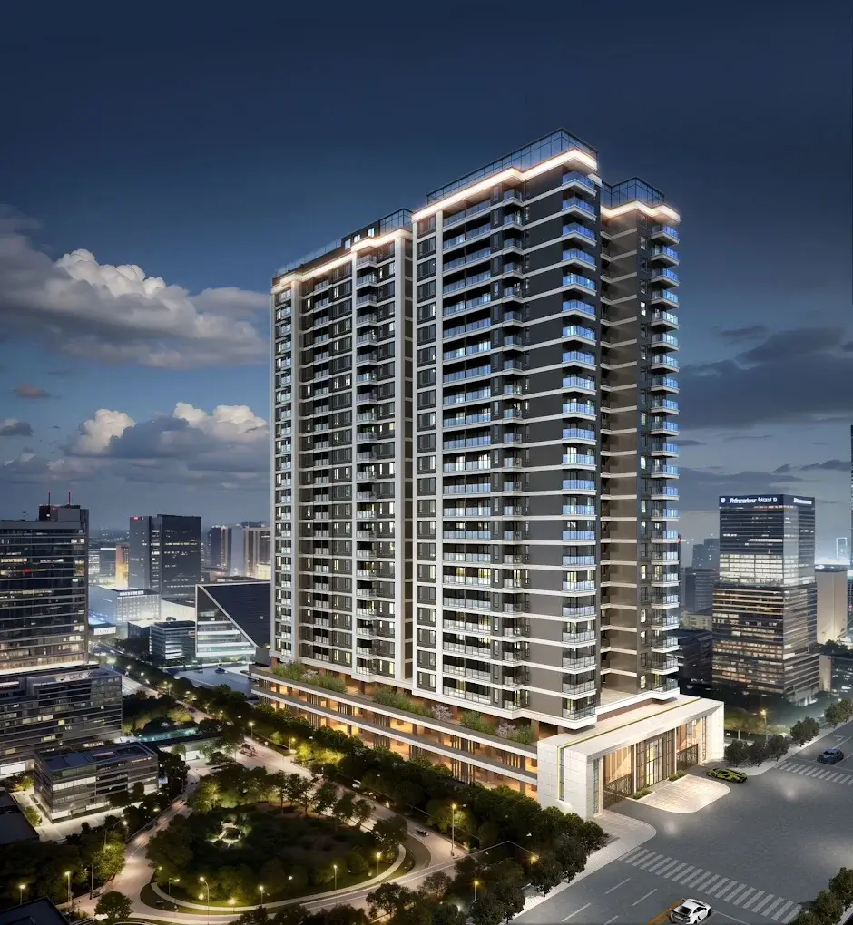 Tall modern high-rise tower lit up at dusk
