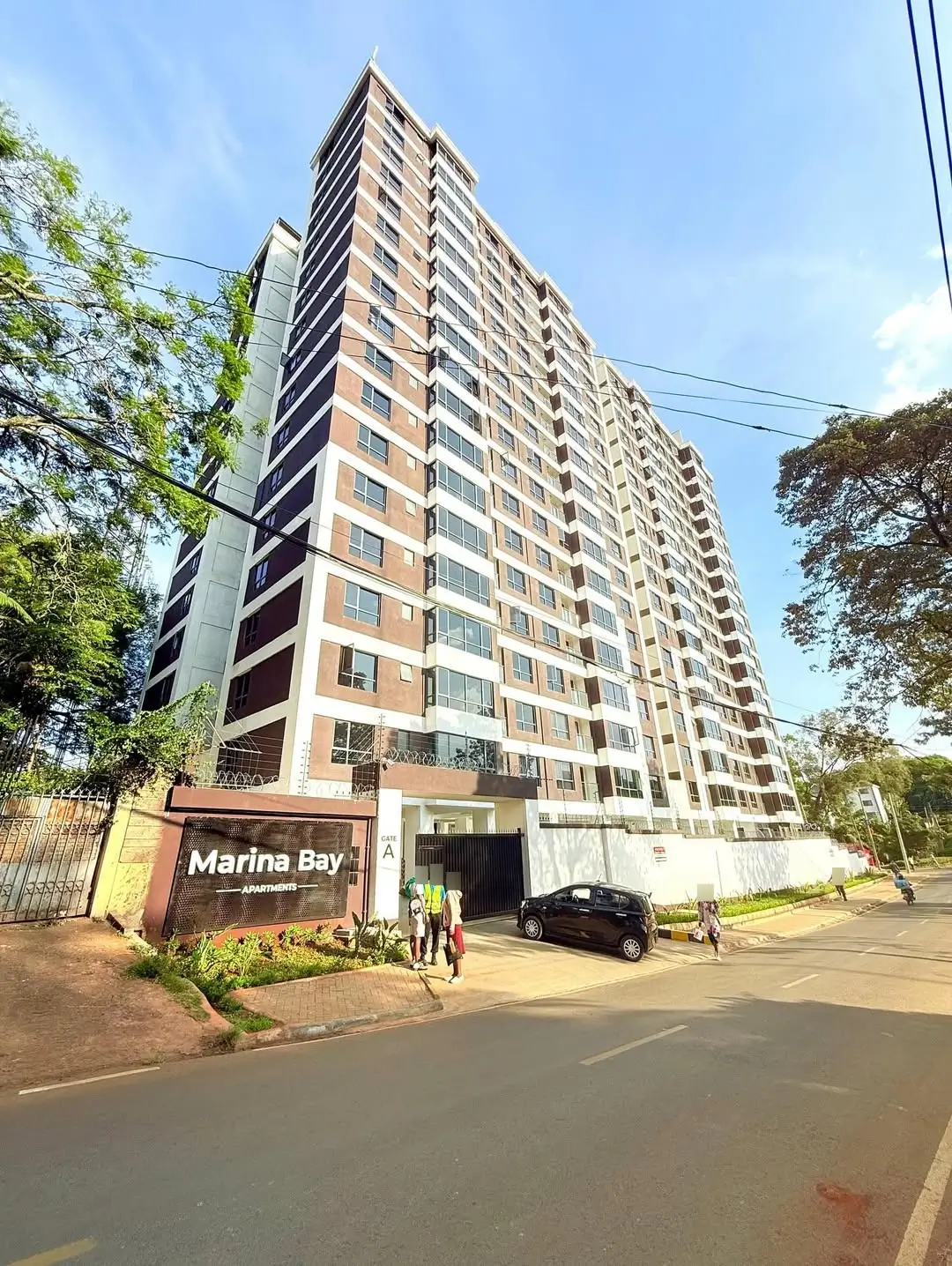 Multi-story residential apartment building with Marina Bay entrance