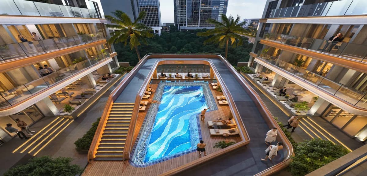 Aerial view of luxury rooftop pool with deck loungers