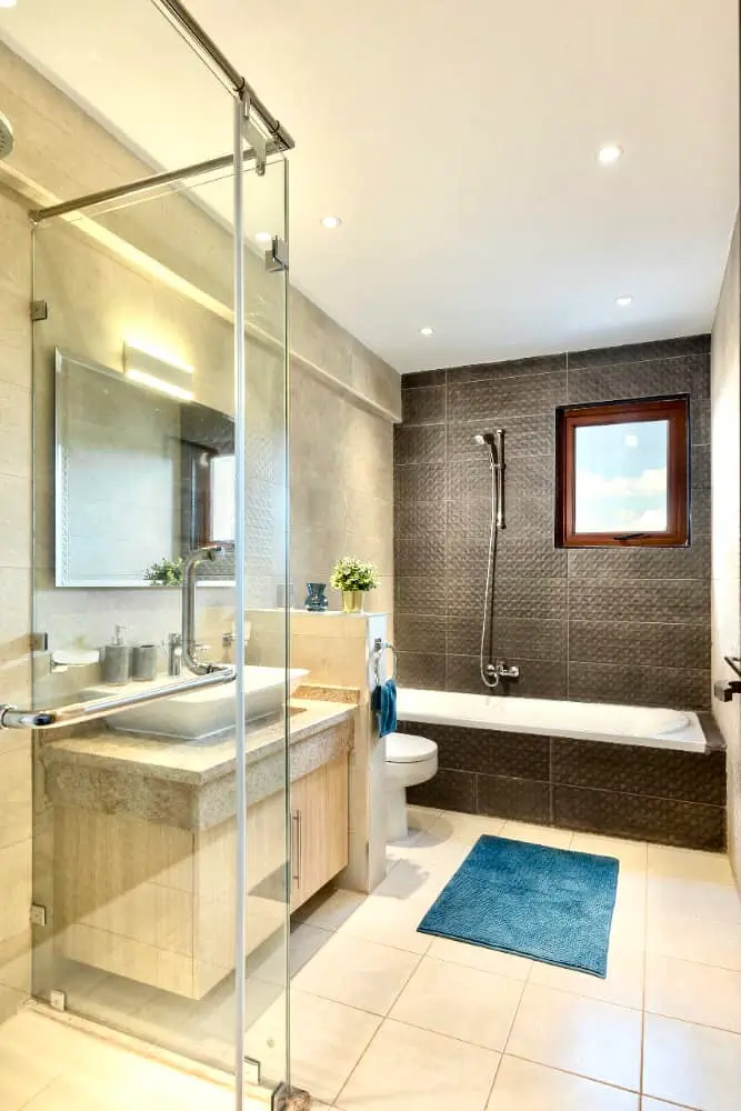 Modern bathroom with walk-in shower, double vanity, bathtub
