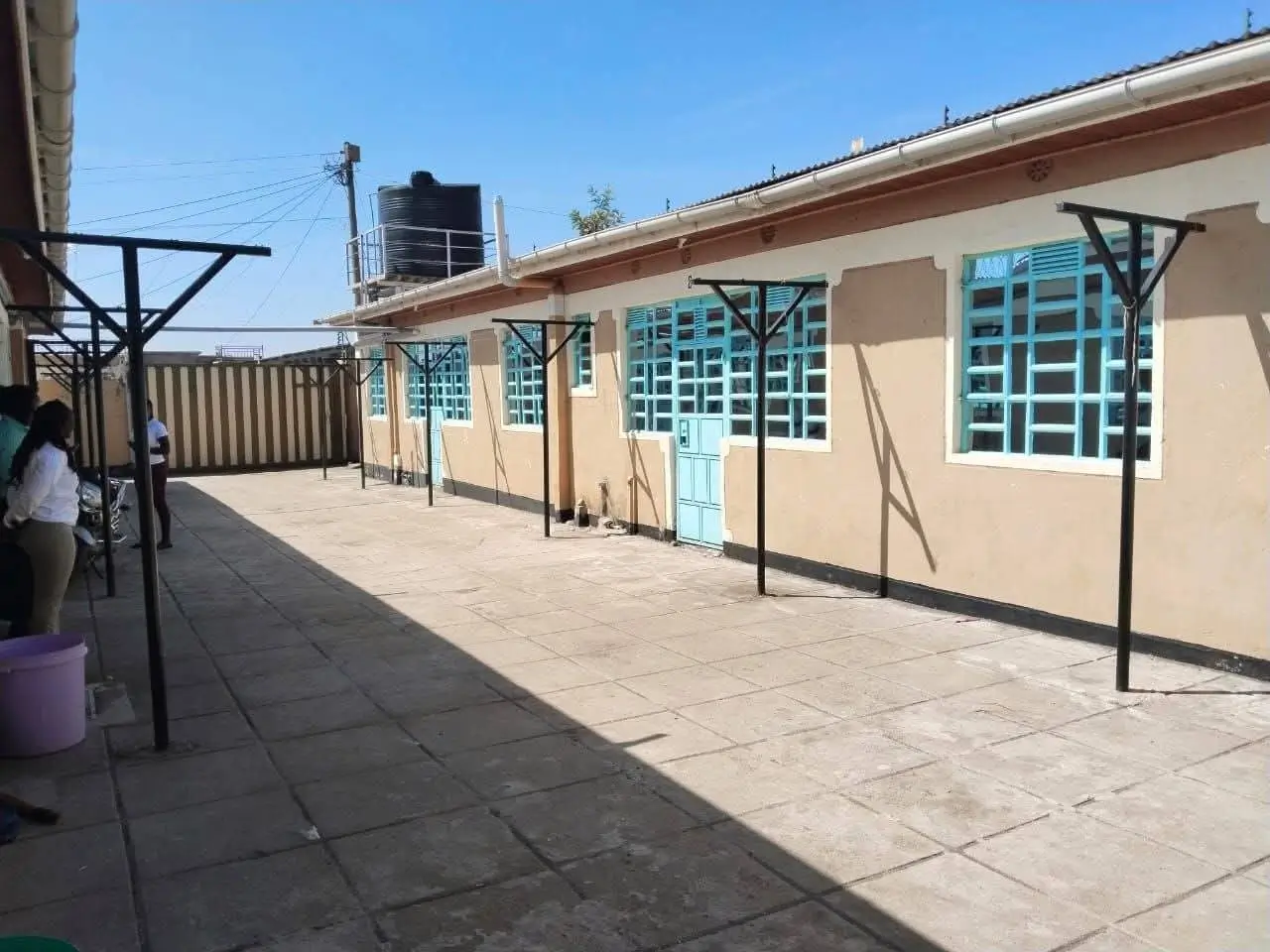 Rooftop terrace with paved flooring and metal railings