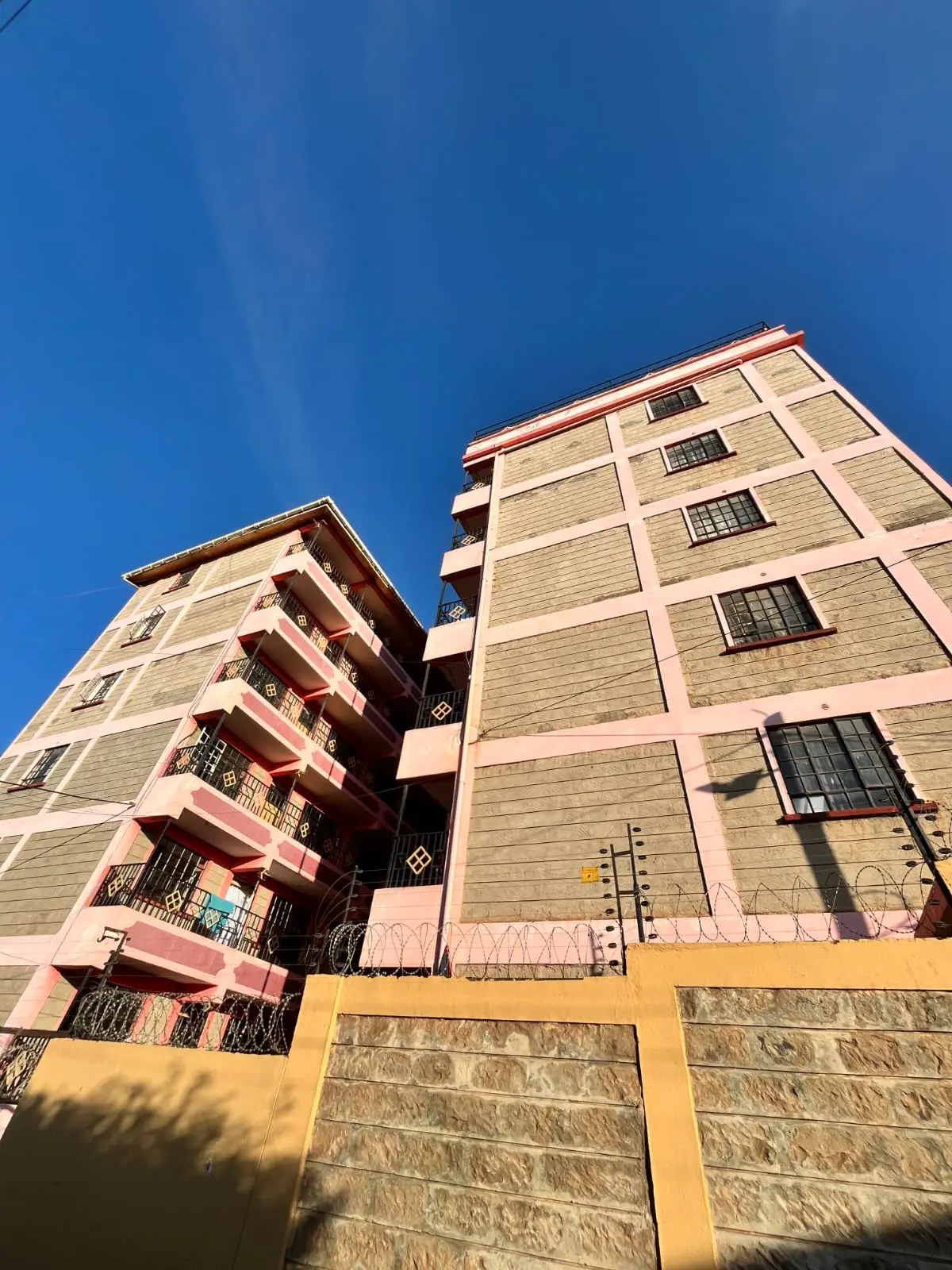 Multi-story residential building facade with balconies