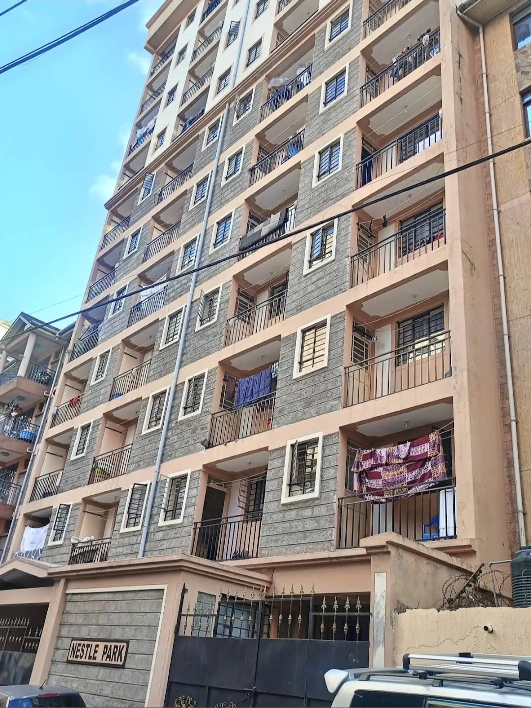 Multi-story residential building facade with balconies