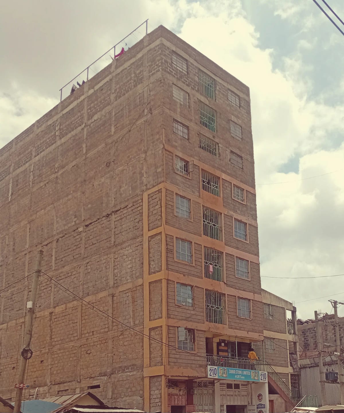 Multi-story residential building facade with brick construction
