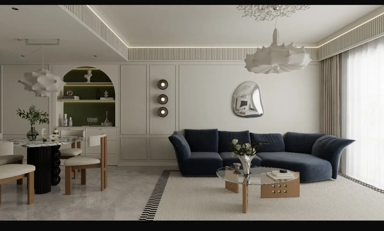 Elegant living room with navy sofa and sculptural pendant lights
