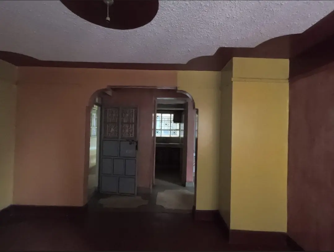 Interior hallway with brown walls and yellow storage unit