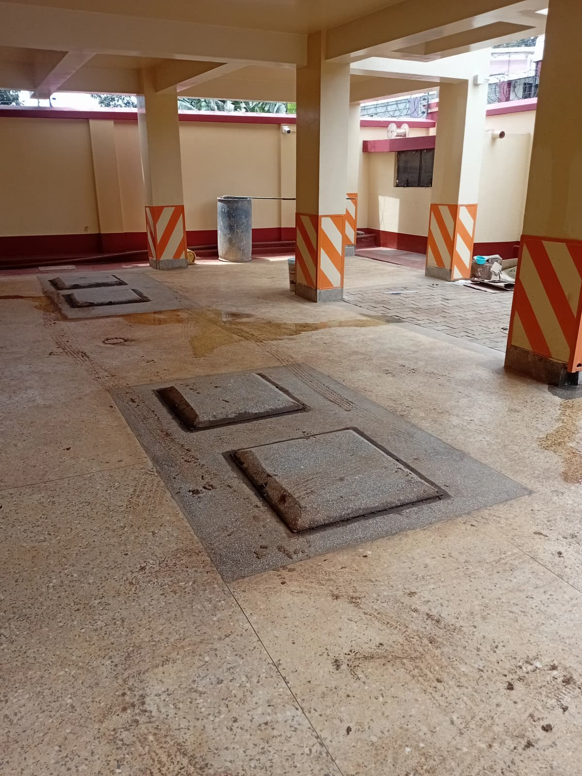 Underground parking garage in construction phase with safety barriers