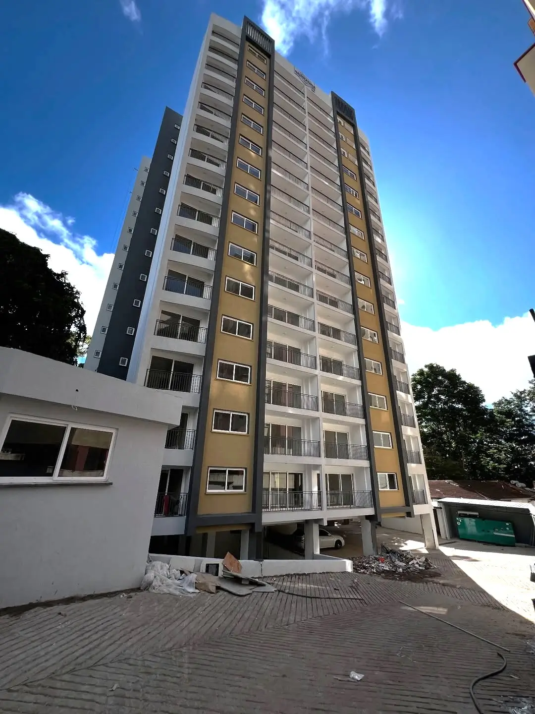 Modern multi-story apartment building facade with balconies