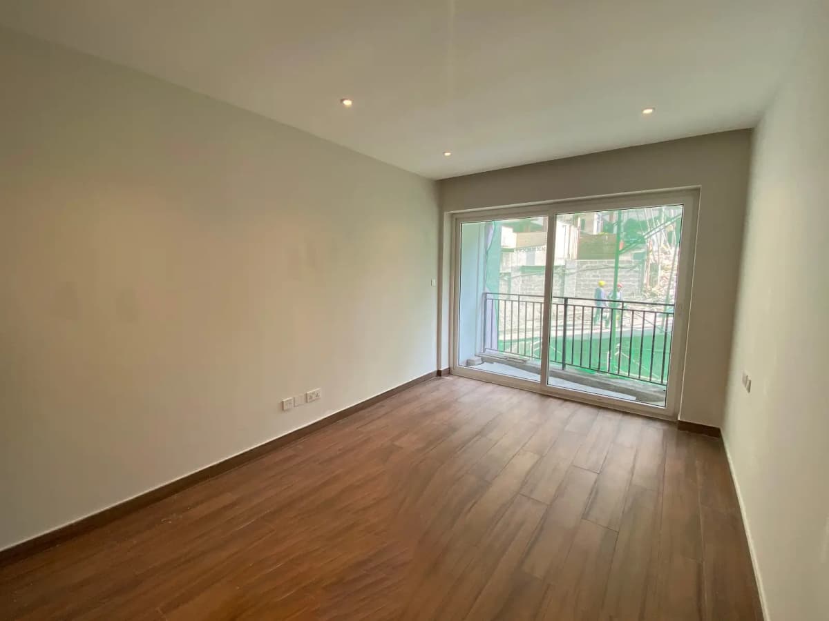 Spacious bedroom with balcony