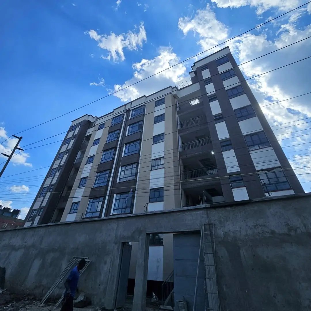 Modern multi-story residential building facade with balconies