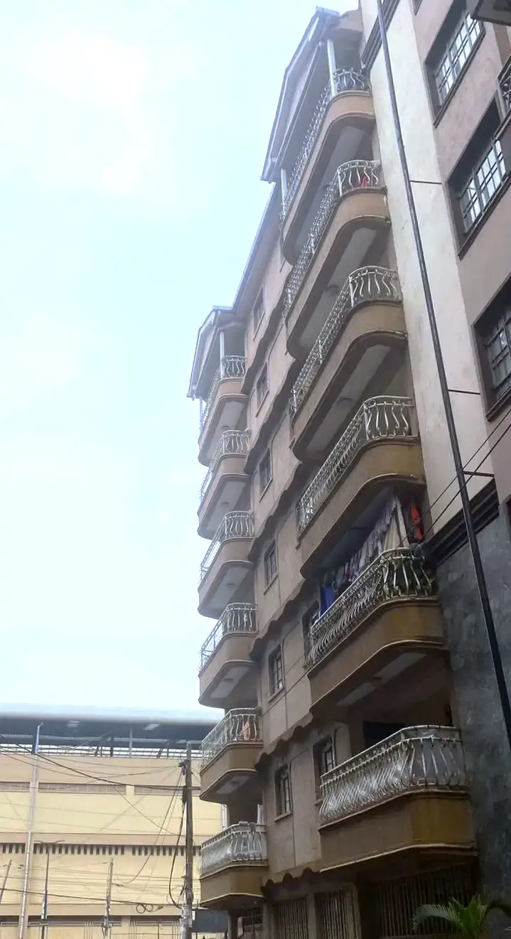 Multi-story residential building facade with balconies