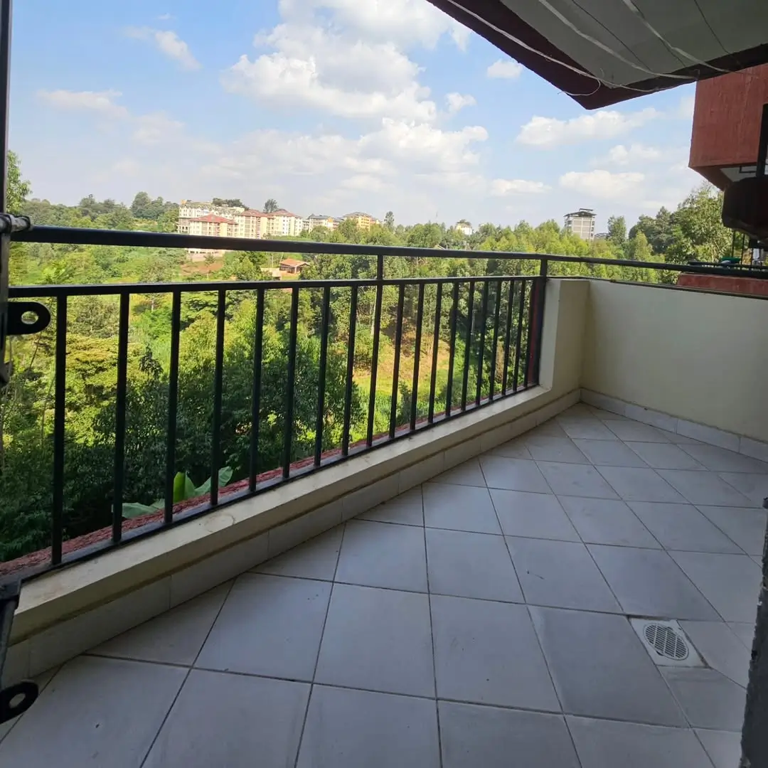 Spacious balcony with green landscape and city views