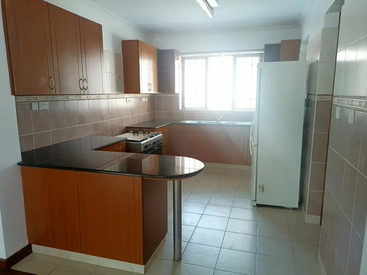 Modern kitchen with island counter and stainless steel appliances