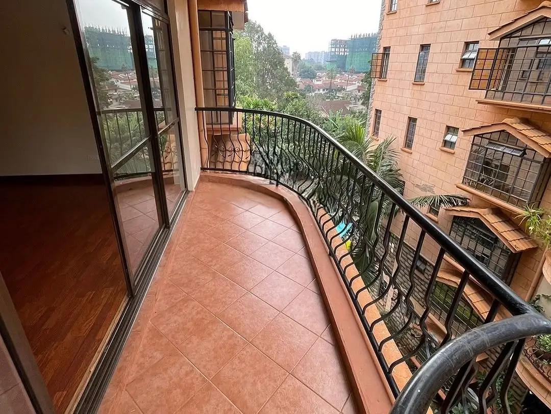 Spacious balcony with terracotta tiles and valley views