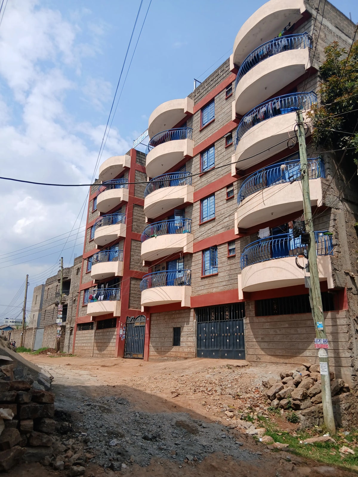 Modern residential apartment building with curved balconies