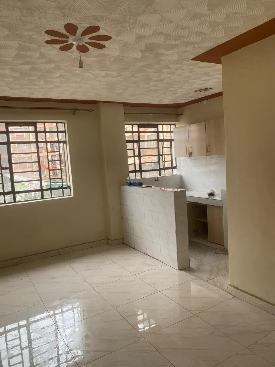 Open-plan living area with integrated kitchen counter space